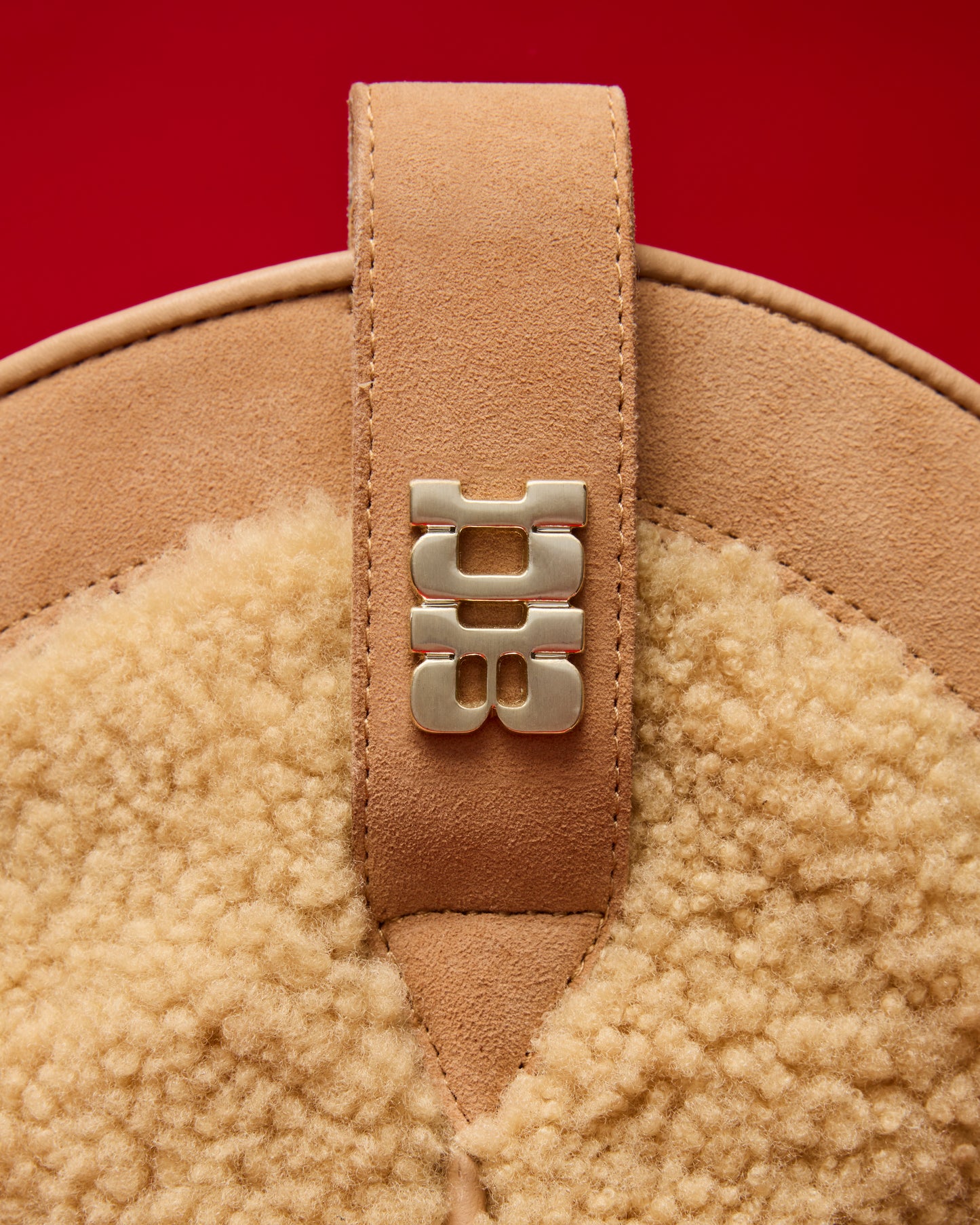 Hardware detail of Tan Suede and shearling cowboy boots