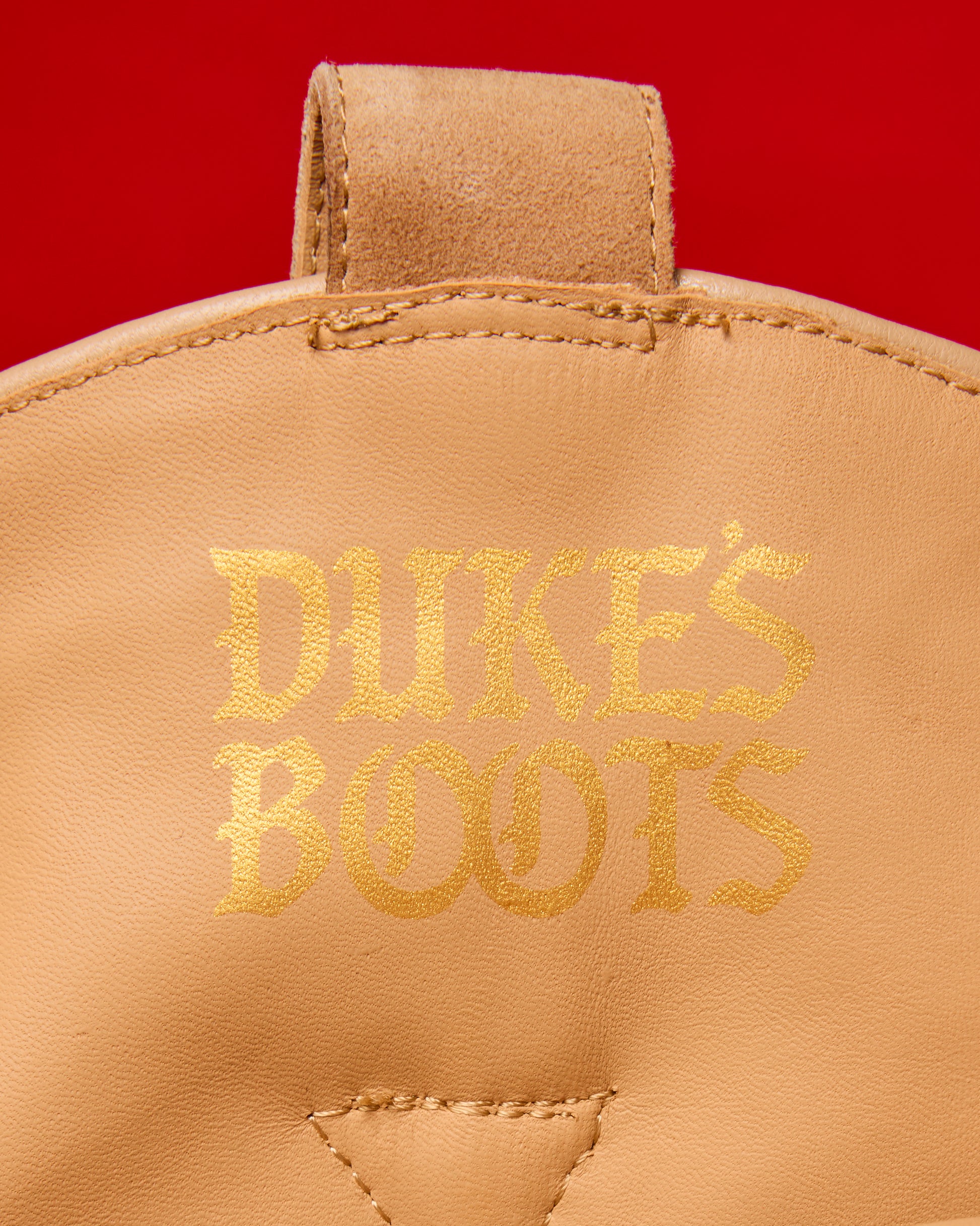 Inner logo of Tan Teddy suede and shearling cowboy boots