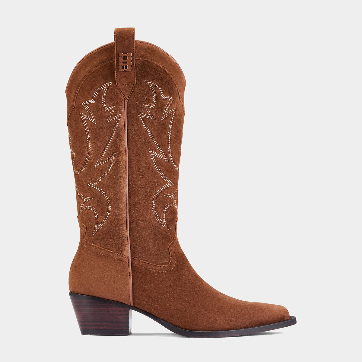 Cognac suede cowboy boot with embroidery detail on a white background - side angle