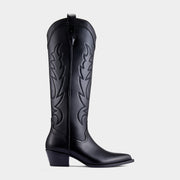Black knee-high cowboy boot with a black embroidery design on a light grey background - back angle